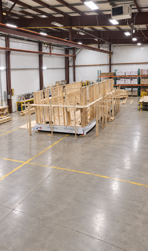 Modular home wall framing inside the warehouse